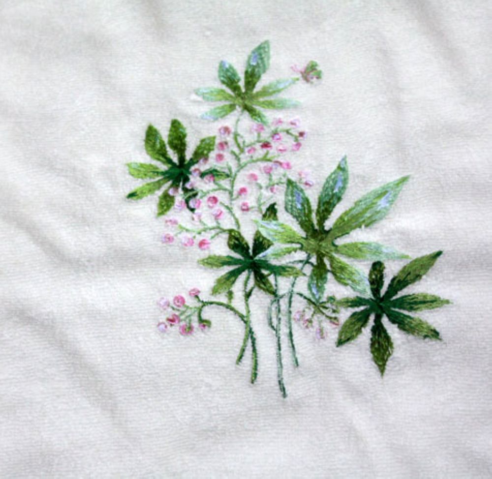 Embroidered white bath towels