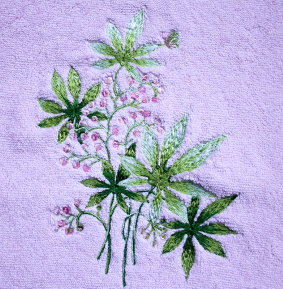 Embroidered white bath towels