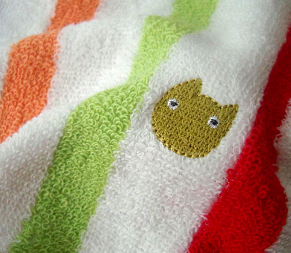 Embroidered stripe face towels